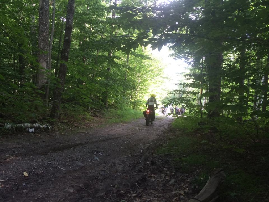 Motorcycle riders on a trail